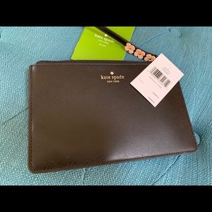 Kate spade clutch with wrist strap